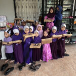 Ayu and the children at Rumah Amal Firdaus.HEIC